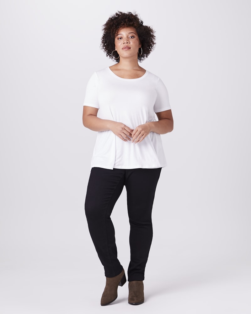 Plus size model with apple body shape wearing Bristol Medium Wash Skinny Jean by Meri Skye | Dia&Co | dia_product_style_image_id:143776